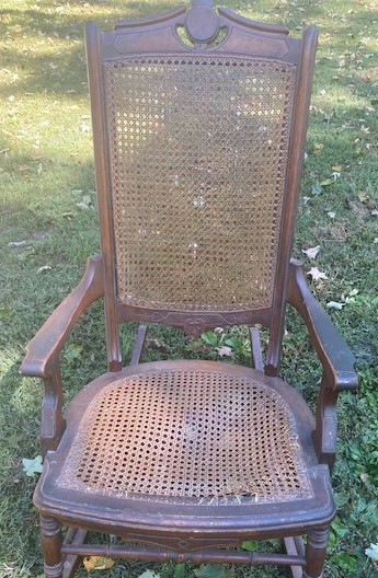 Before- Rocker was brought to me to be cleaned up and re-caned.